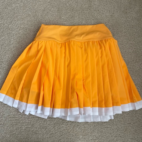 Aerie Offline Pleated Orange Skirt with White Trim and Built-in shorts - Picture 5 of 7